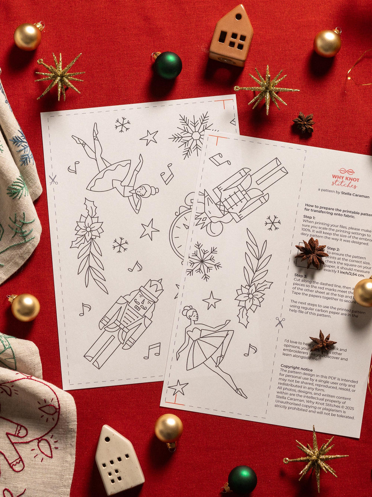 May include: Two white printable patterns with black line drawings of ballerinas, snowflakes, and a nutcracker. The patterns are surrounded by Christmas ornaments and decorative items on a red surface. The text "WHY KNOT stitches" is visible.